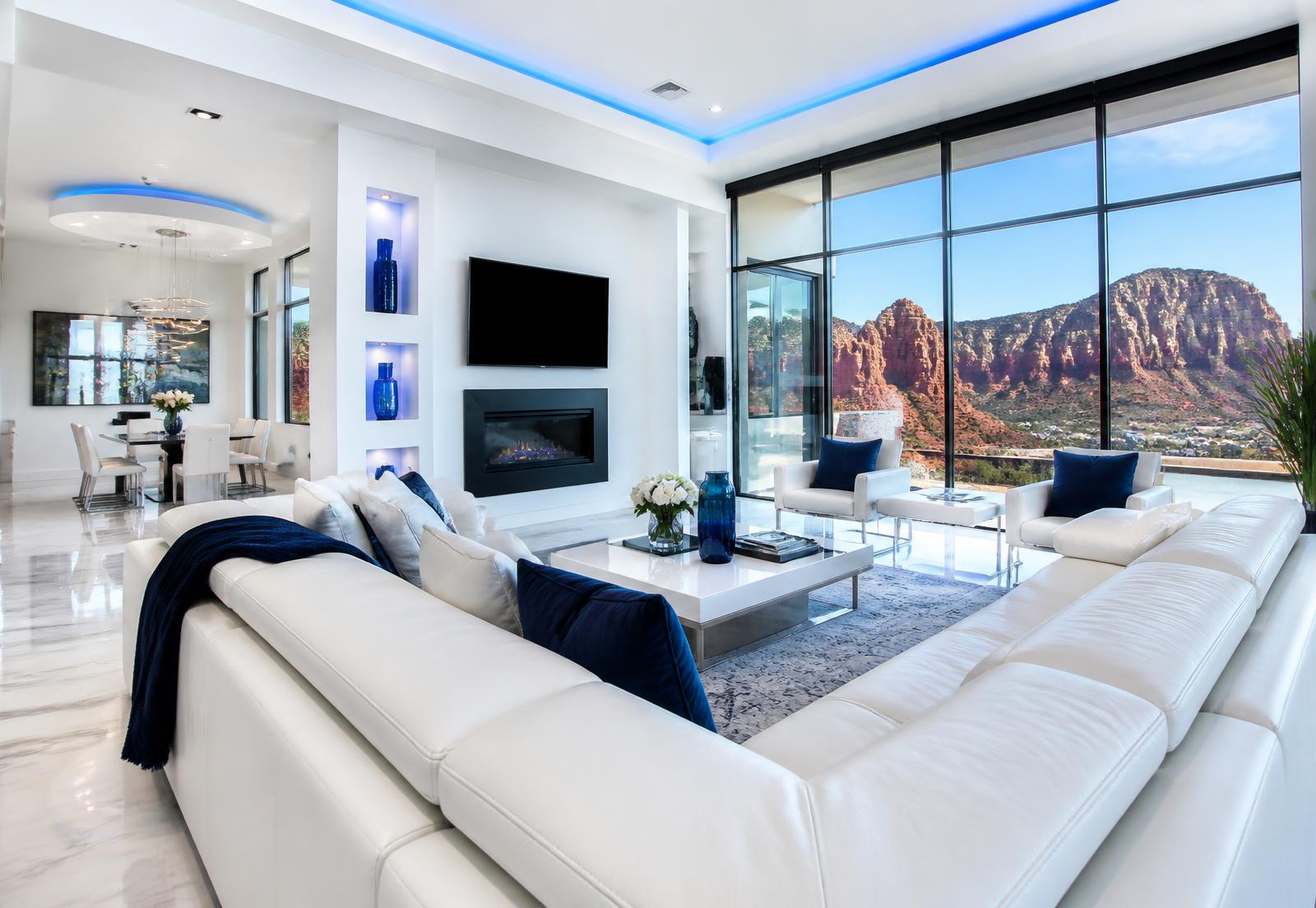 Sunlit luxury living room in St. George with red rock canyon views